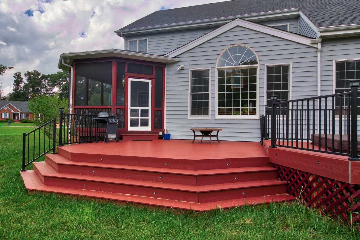 Custom Red Deck With Blue House Deck Creations Outdoor Living Richmond Charlottesville Hampton Roads