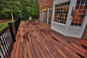 Brick House with a Wooden Deck After Rain in Williamsburg VA