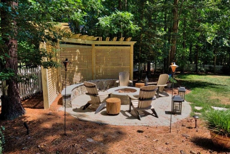 Beautiful Stone Fire Pit and Outdoor Hardscape Design by Deck Creations in Virginia.