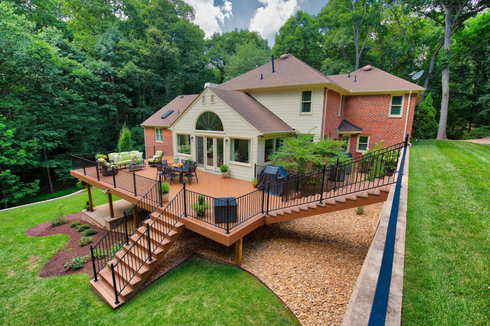 A magnificent wooden deck, expertly designed and built by Deck Creations.