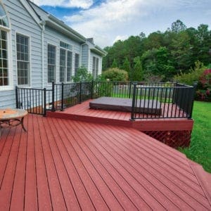 Custom Red Wood Deck with Hot Tub built by Deck Creations.