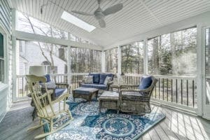 White Screened Porch with Ceiling Fan Designed by Deck Creations in Newport, VA