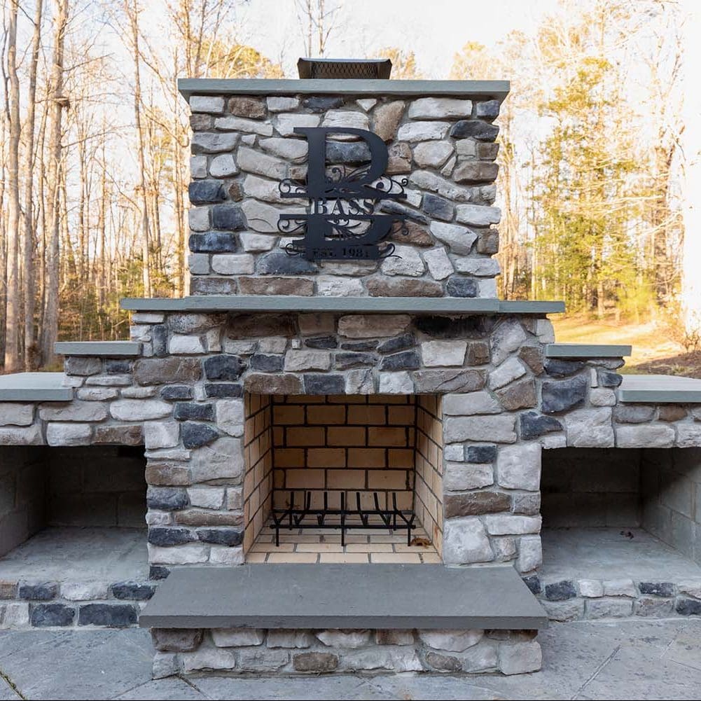 Outdoor Stone Fireplace designed by Deck Creations.