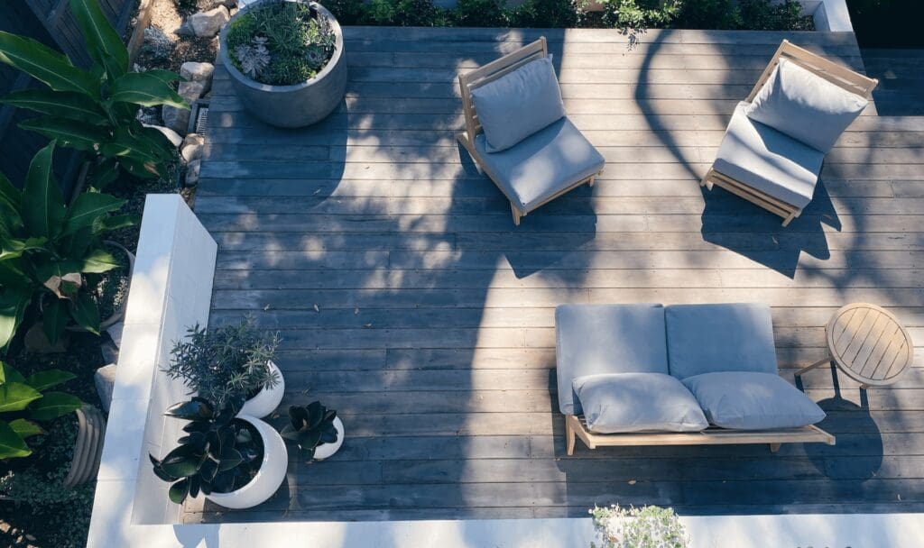 Aerial view of a trendy, minimalistic wood deck designed by Deck Creations.