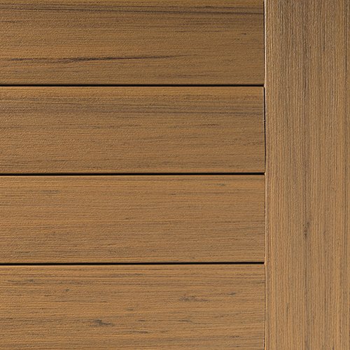 Close-up of wooden texture featuring horizontal planks on the left and vertical trim on the right. The wood is light brown with subtle grain lines.