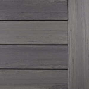 Close-up of a gray wooden deck panel featuring horizontal planks with a smooth, matte finish, showcasing the subtle wood grain texture.