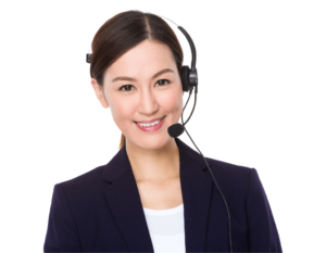 A woman wearing a headset and a navy blazer smiles facing the camera, capturing the essence of outdoor living with an air of effortless confidence.