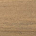 Close-up of a smooth wooden surface with a natural brown grain pattern.